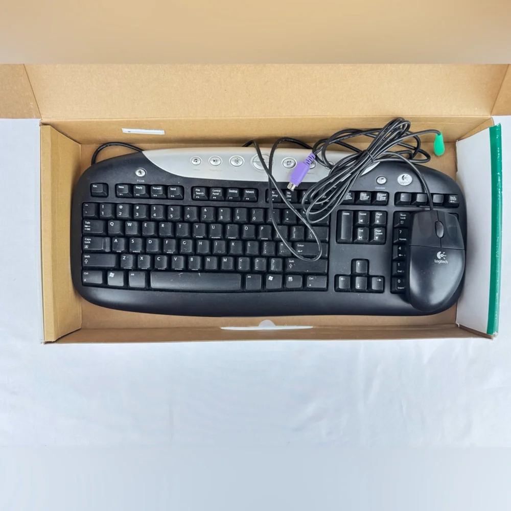 NWT Logitech Desktop EX 100 with Mouse and Arm Rest